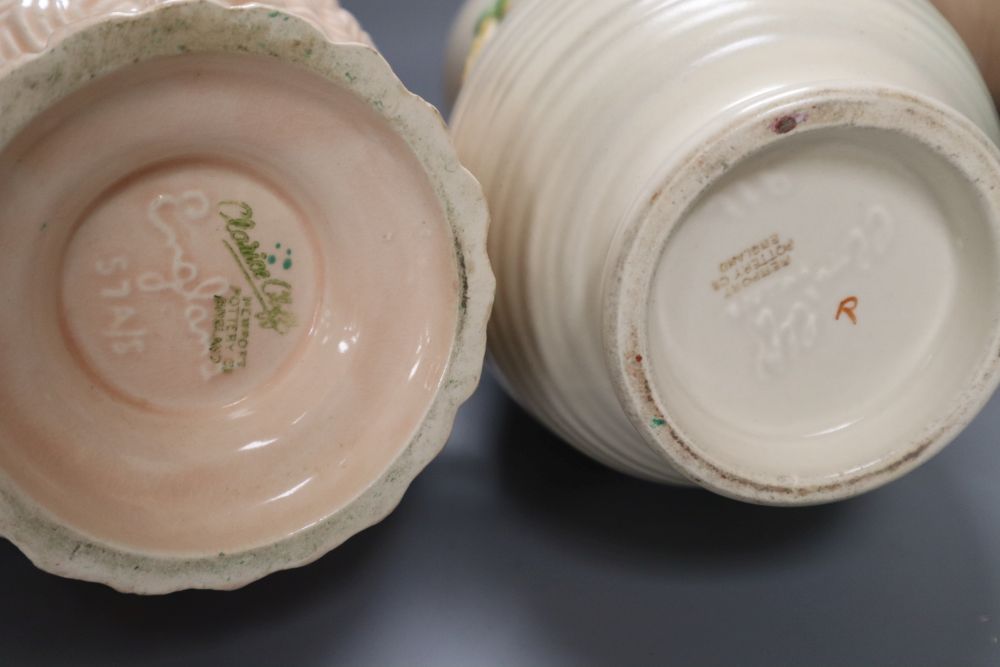 A group of post-war Clarice Cliff including a My Garden vase and jug, Water Lily bowl, 21cm wide, Celtic Harvest jug and two 1930s jugs
